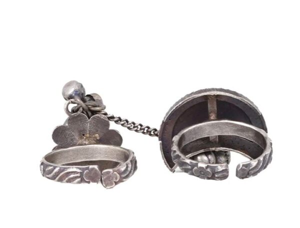 oxidised adjustable dual ring attached with a silver chain & designed with ghungroos in flower & moon pattern.